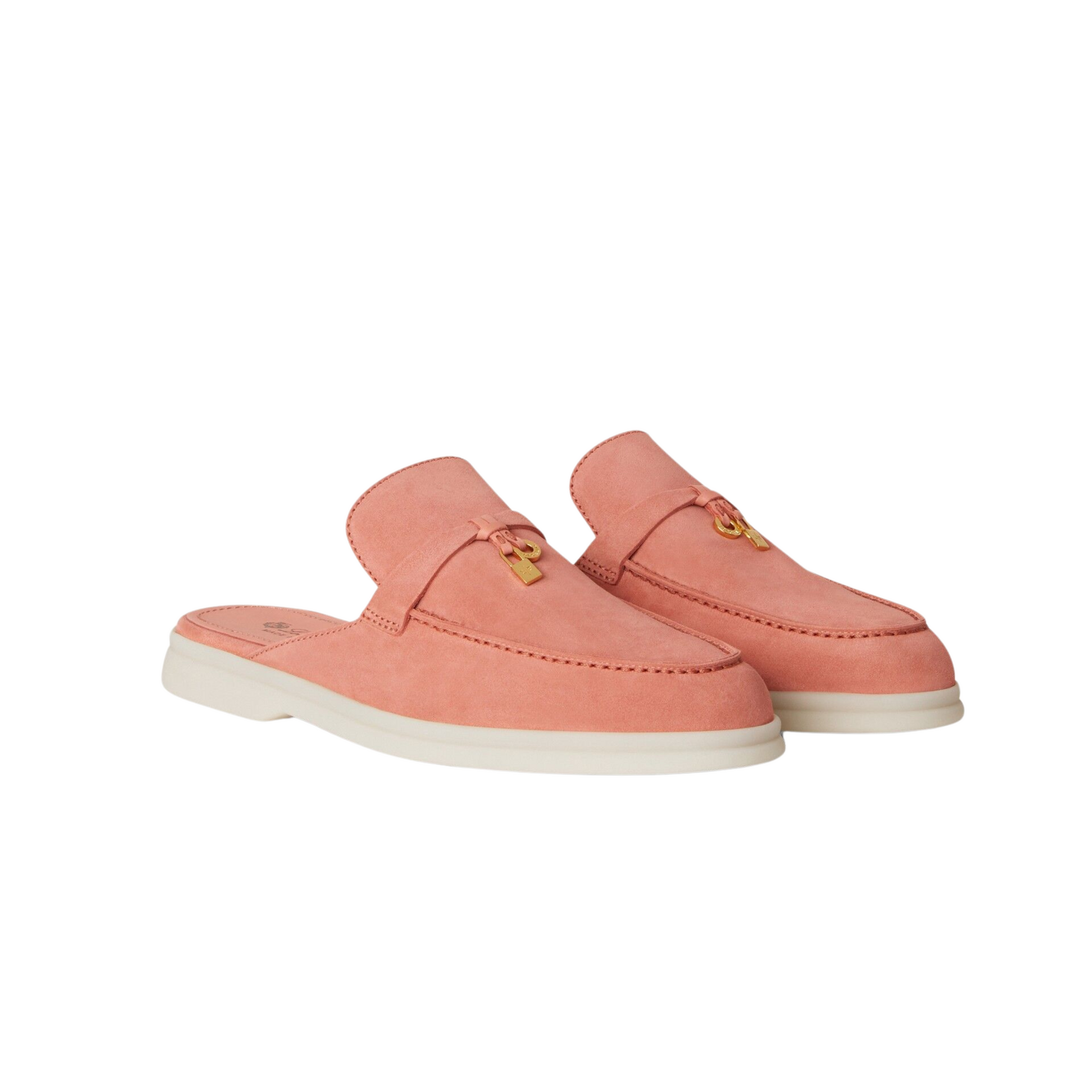 Beige leather backless loafers with contrast stitching on marble