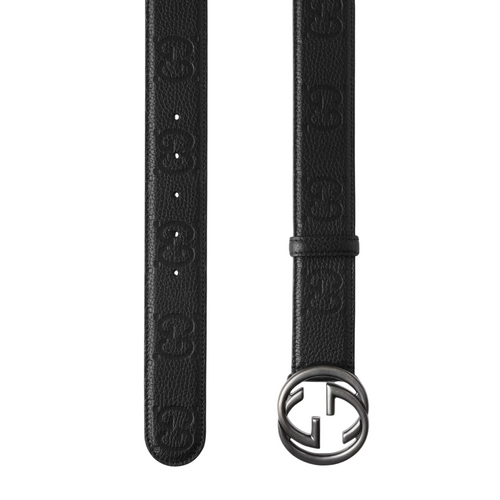 Black leather belt with a silver buckle on a white background
